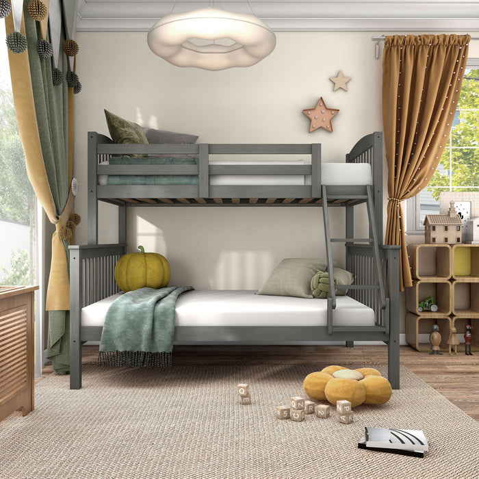 Front facing Mission style twin-over-full grey wood bunk bed in a room with linens and accessories