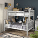 Left facing Mission style twin-over-full white wood bunk bed in a room with linens and accessories