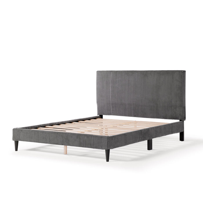 Left facing modern dark grey corduroy channel tufted headboard queen platform bed on a white background