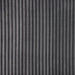 Close up fabric swatch of a modern dark grey corduroy channel tufted headboard queen platform bed