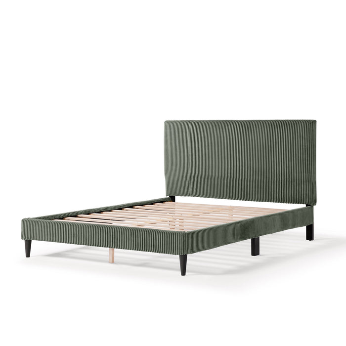 Left facing modern green corduroy channel tufted headboard queen platform bed on a white background