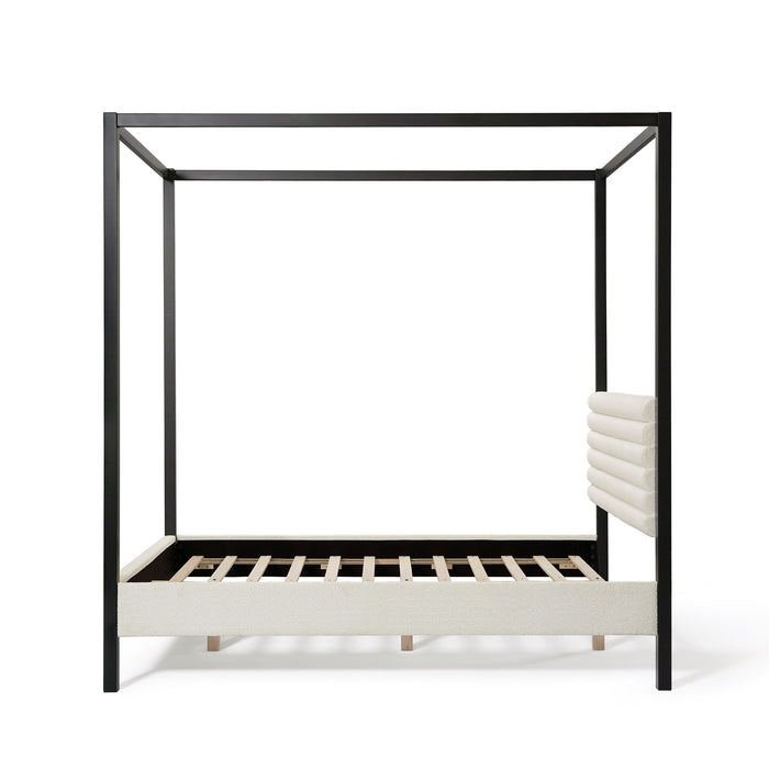 Front facing side view of a modern black finish queen canopy platform bed with white boucle upholstery on a white background