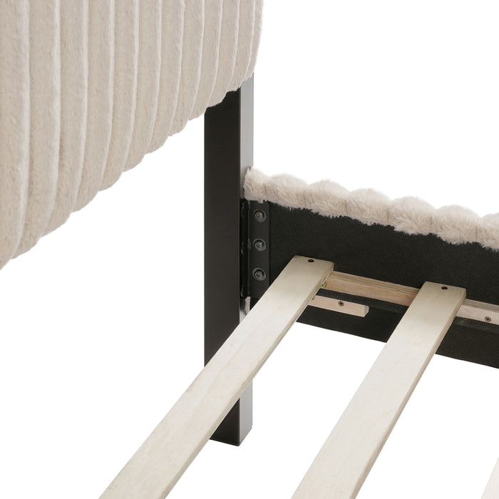 Right facing close up view of the headboard corner and slats of a modern black finish queen canopy platform bed with light brown corduroy fur upholstery on a white background