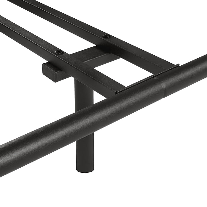 Left facing close up view of T-supports on an industrial black metal full bed frame with rounded head and footboards on a white background