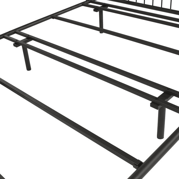 Left facing close up view of T-supports on an industrial black metal full bed frame with rounded head and footboards on a white background