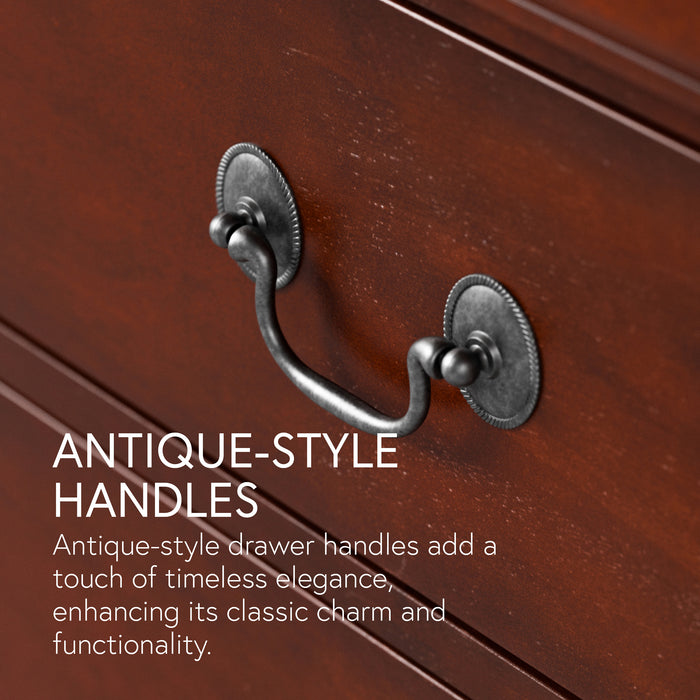 Informational close up image with a traditional cherry finish solid wood two-drawer nightstand highlighting its antique style hanging drawer pulls