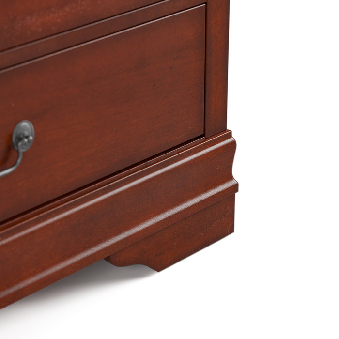 Right facing close up of a traditional cherry finish solid wood six-drawer dresser with a framed mirror showing its lower molded trim and bracket foot, on a white background