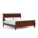 Right facing traditional cherry finish solid wood king sleigh bed with linens on a white background