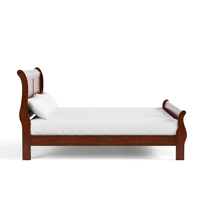 Front facing side view of a traditional cherry finish solid wood Eastern king sleigh bed with linens on a white background