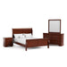 Right facing four-piece traditional cherry finish solid wood queen bedroom set with (1) queen sleigh bed, (1) two-drawer nightstand, (1) six-drawer dresser, and (1) mirror on a white background