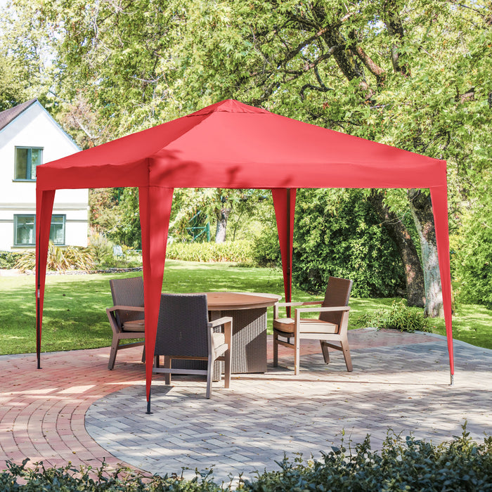 Right facing modern red portable camping gazebo canopy with roof and anchors on a patio with accessories