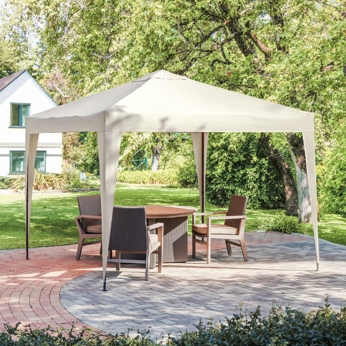 Right facing modern white portable camping gazebo canopy with roof and anchors on a patio with accessories