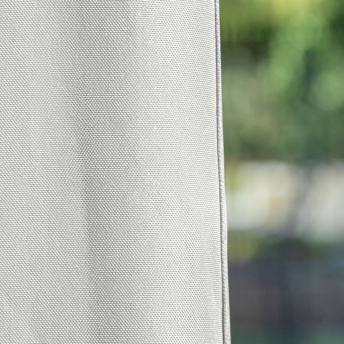 Close up view of the fabric of a modern white portable camping gazebo canopy with roof and anchors