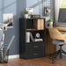 Right facing durable modern two-shelf black storage bookcase in a larger modular configuration in a room with accessories