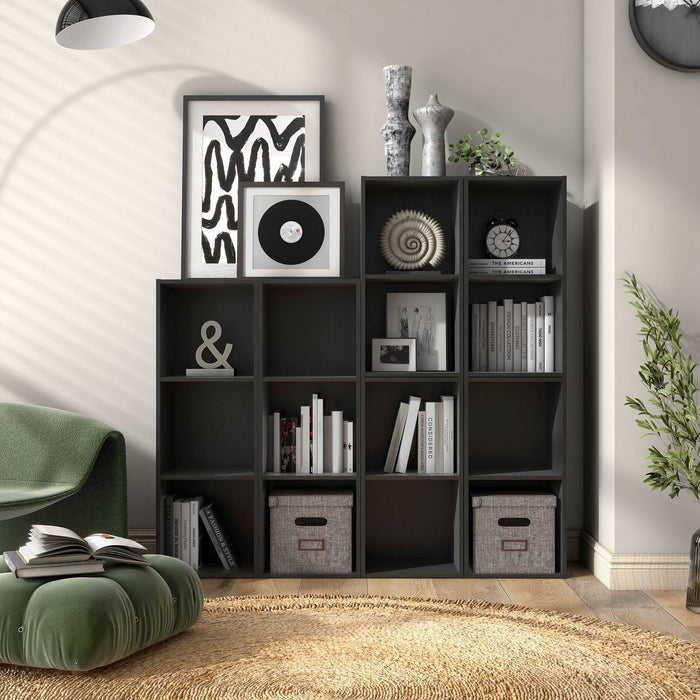 Front facing durable modern two-shelf slim black bookcase as part of a larger modular configuration in a room with accessories