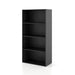 Left facing durable modern four-shelf black storage bookcase in a larger modular configuration in a room with accessories