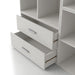 Left facing modern two-drawer white storage cabinet with silver handles and drawers open in a larger modular bookcase on a white background