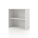 Left facing durable modern two-shelf white storage bookcase on a white background