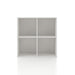 Front facing durable modern four-cubby white storage bookcase on a white background