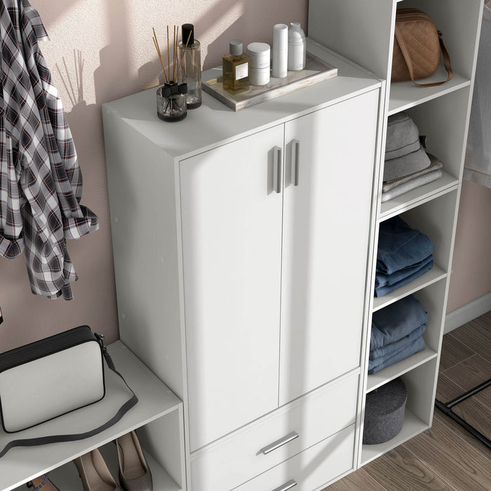 Right facing high-camera view of a durable modern two-door white storage cabinet with silver handles as part of a larger modular configuration in a room with accessories