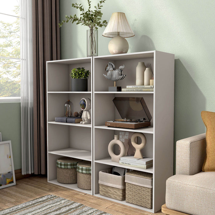 Left facing durable modern four-shelf taupe grey storage bookcase in a larger modular configuration in a room with accessories