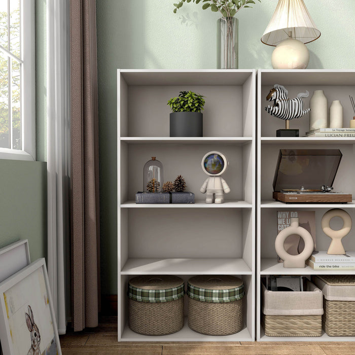 Front facing durable modern four-shelf taupe grey storage bookcase in a larger modular configuration in a room with accessories