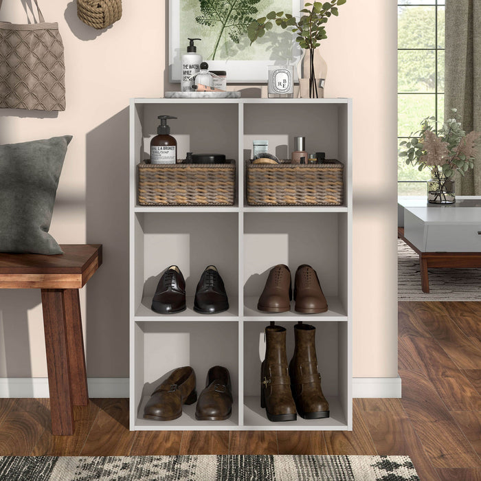 Front facing durable modern six-cubby taupe grey storage bookcase in a room with accessories