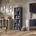 Left facing durable modern six-cubby steel blue storage bookcase as part of a larger modular configuration in a room with accessories