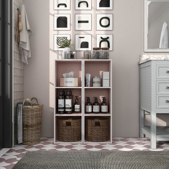 Front facing durable modern three-shelf slim light pink storage bookcase in a larger modular configuration in a room with accessories