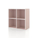 Left facing durable modern four-cubby light pink storage bookcase on a white background