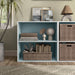 Front facing durable modern two-shelf light blue storage bookcase as part of a larger modular bookcase in a room with accessories