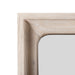 Front facing close up of the framed mirror on a transitional light oak seven-drawer dresser and mirror with a metal base