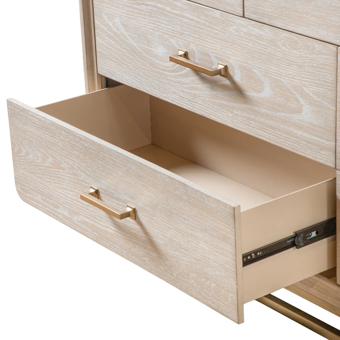 Left facing close up of an open drawer on a transitional light oak seven-drawer dresser with a metal base, on a white background