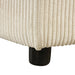 Close-up leg detail of a chenille reversible sectional with storage chaise on a white background