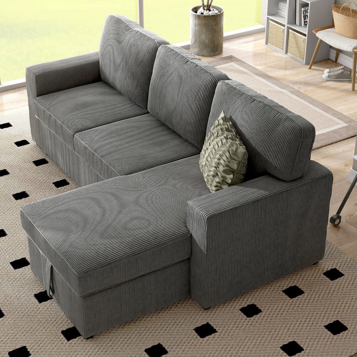 Top-view of a chenille reversible sectional with storage chaise in a stylish living room with accessories