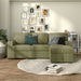 Front-facing chenille reversible sectional with storage chaise in a stylish living room with accessories