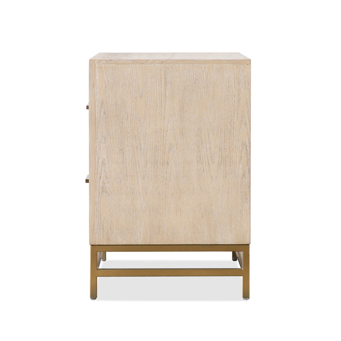 Front facing side view of a transitional light oak two-drawer nightstand with a metal base on a white background