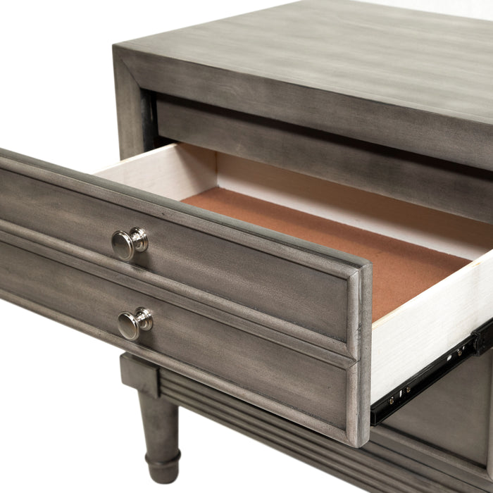 Detail shot of the open top drawer of a transitional grey 2-drawer nightstand against a white background. The top drawer, open on metal glides, has a double-drawer facet with two silver knobs. The open drawer reveals a felt-lining and a hidden jewelry tray drawer.