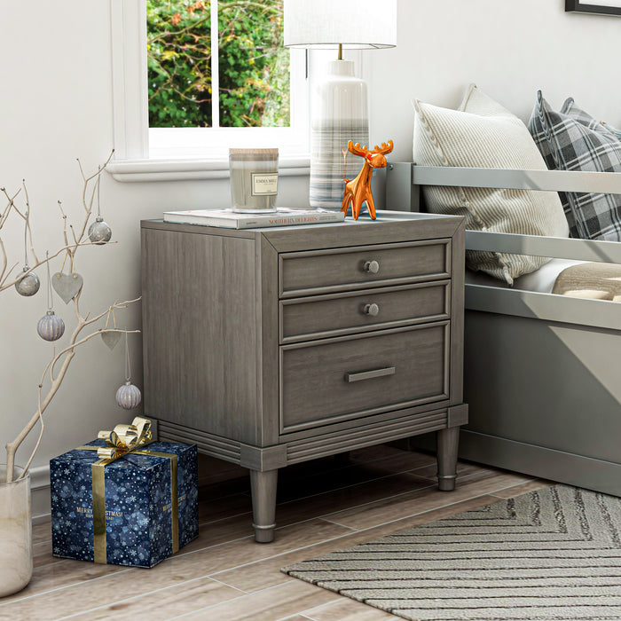 Left-angled transitional grey 2-drawer nightstand in a Christmas decorated grey bedroom.